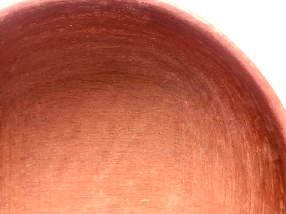 Mexico 1492: Salad bowl, made out of beautiful, red clay, and polished until a special glow is achieved. The rough beauty of the San Marcos pottery transcends its humble origins. It is usually women that work with the clay, and these bowls are no exception.   Lead free, unglazed. Thanks to the amazing, random pattern of the flame marks, no two pieces are the same. 