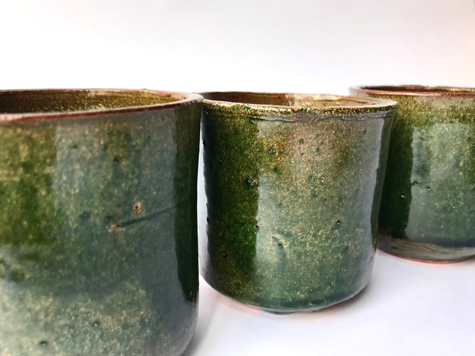 Mexico 1492: Small, green glazed clay cups, an ideal vessel for mixologists - they showcase lime and orange wedges or zest, olives, strawberries or salt like no other.   With the new, lead-free technique for glazing, we can safely enjoy these beauties today as utilitarian pieces in your kitchen or bar.