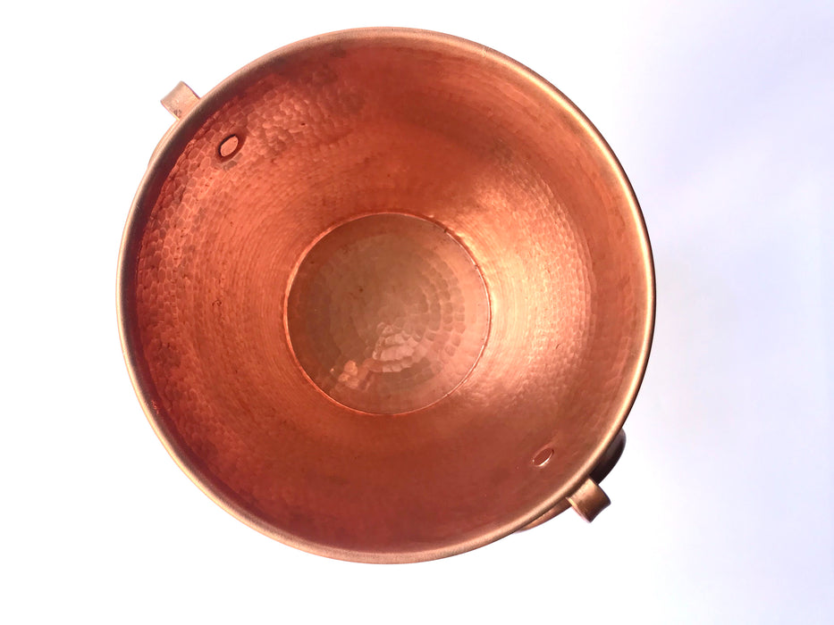 Mexico 1492: Copper ice-bucket, hand made by the master coppersmiths of Michoacán, through carefully hammering its surface until achieving perfection. 