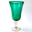 Mexico 1492: Shaped like a colored bell, with a transparent stem and foot, and hundreds of air bubbles reflecting the light, these classic wine glasses are a centerpiece and a conversation starter. Hand made with care, reflecting decades of traditional Mexican glass factories.  Available in Amethyst Purple, Turquoise, Fire Red, Cobalt Blue, Emerald Green, Lime Green and Smoke. 