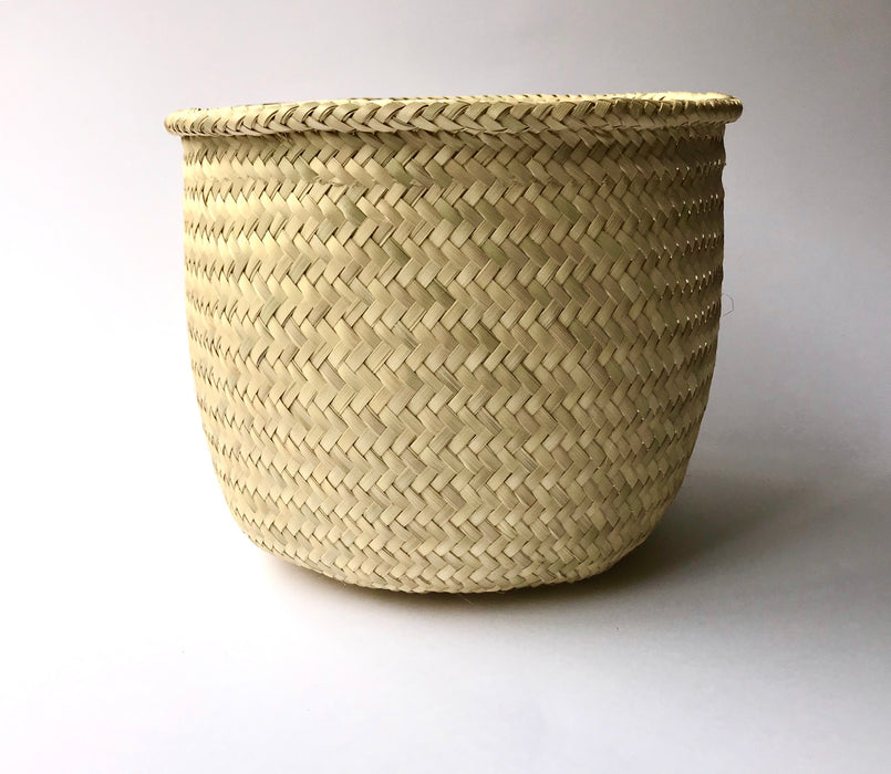Mexico 1492: Delicate, soft basket made of palm fiber in Oaxaca. Great option for holding fruit, utensils, or small kitchen gadgets. 