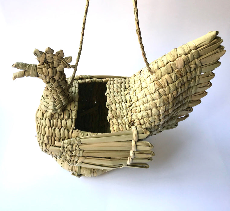 Mexico 1492: A piece that will lighten up any kitchen - whimsical hen-shaped egg basket made of chuspata (bulrush) fiber by skillful Michoacán artisans. 