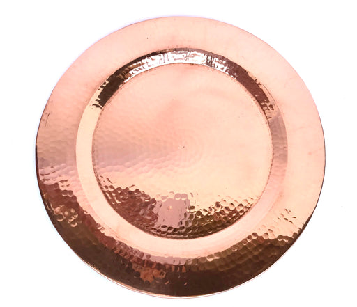 Mexico 1492: Elegant copper base plates, hammered by hand, add the spark and glow popping up under the dinner plates to any party or a romantic dinner. Especially gorgeous next to the candlelight. D 30cm (11.8")