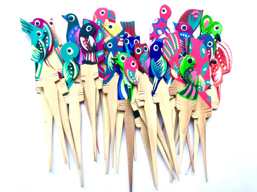 Mexico 1492: Painted Wooden Bird Shaped Picks. Ideal for serving cheese cubes, olives, or appetizers of any kind, but also the lemon slices with tequila, or the orange slices with a smooth, smoky mezcal shot. Colorful, hand-painted, with the bird pattern, this Oaxacan basic utensil, so simple in function but so rich in visual effect, enlightens your reunions like no other pick can.