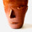 Red Clay Lidded Jar with Face