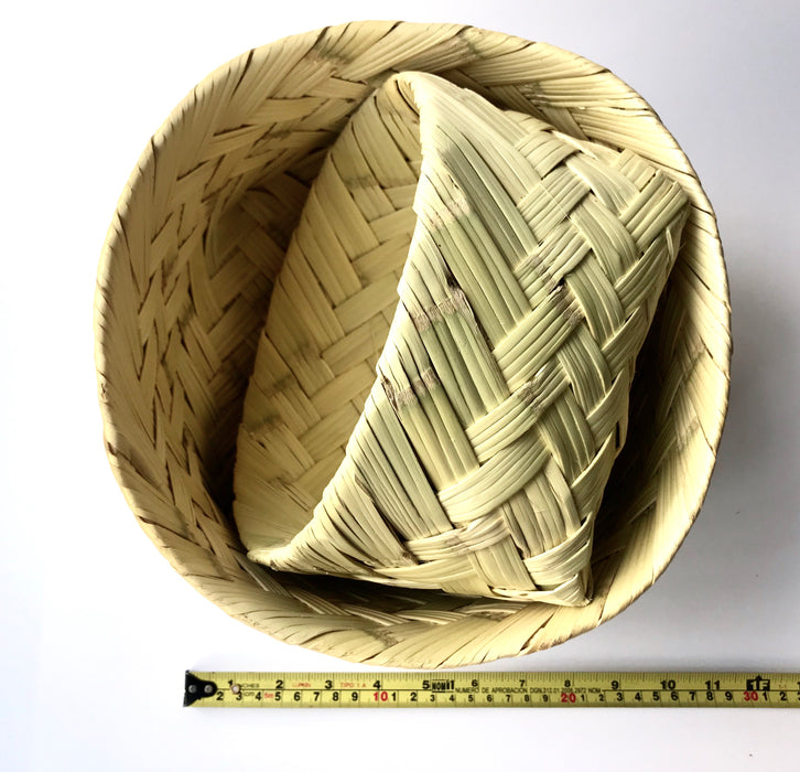 Charming, woven carrizo baskets from Michoacan, also known as chiquihuites, traditionally used for holding warm tortillas wrapped in a colorful cotton napkin. Set of 2.