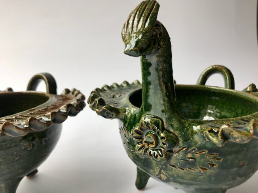 Mexico 1492: Whimsical bird-shaped salsa bowls, with ornaments like flowers or fruit. Made of clay, then bathed in spectacular, world-famous, lead-free green glaze.  With the new, lead-free technique for glazing, we can safely enjoy these beauties today as both decorative and utilitarian pieces. Great for serving salsa, appetizers, dips, marmalade, salt and spices.