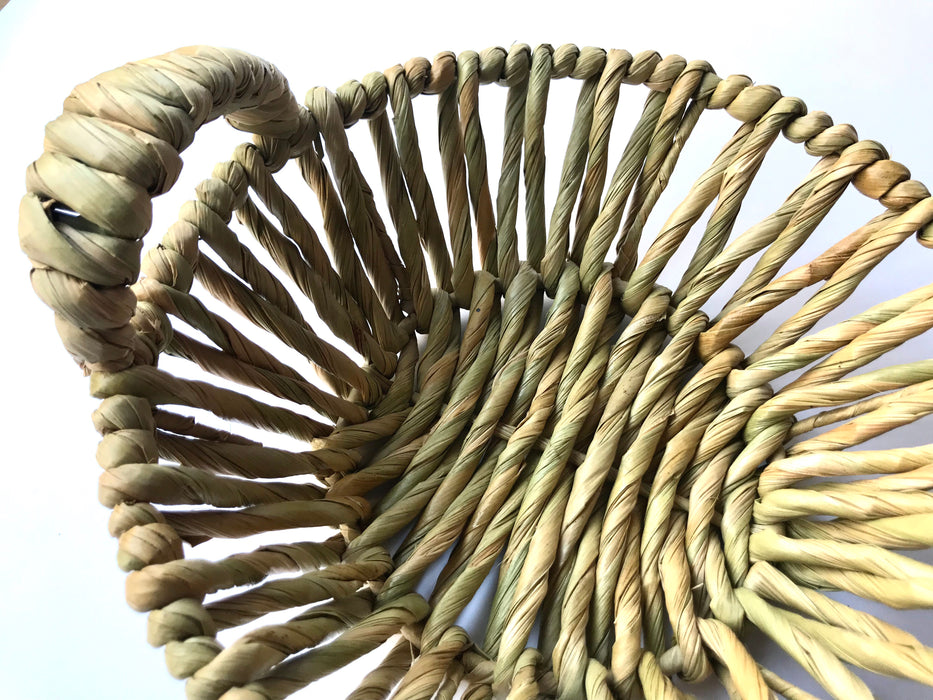 Mexico 1492: Fruit or egg basket made of tule fiber by skillful Michoacán artisans. The thick tule cords offer a comfortable, rich, full texture of this beautiful, natural piece.