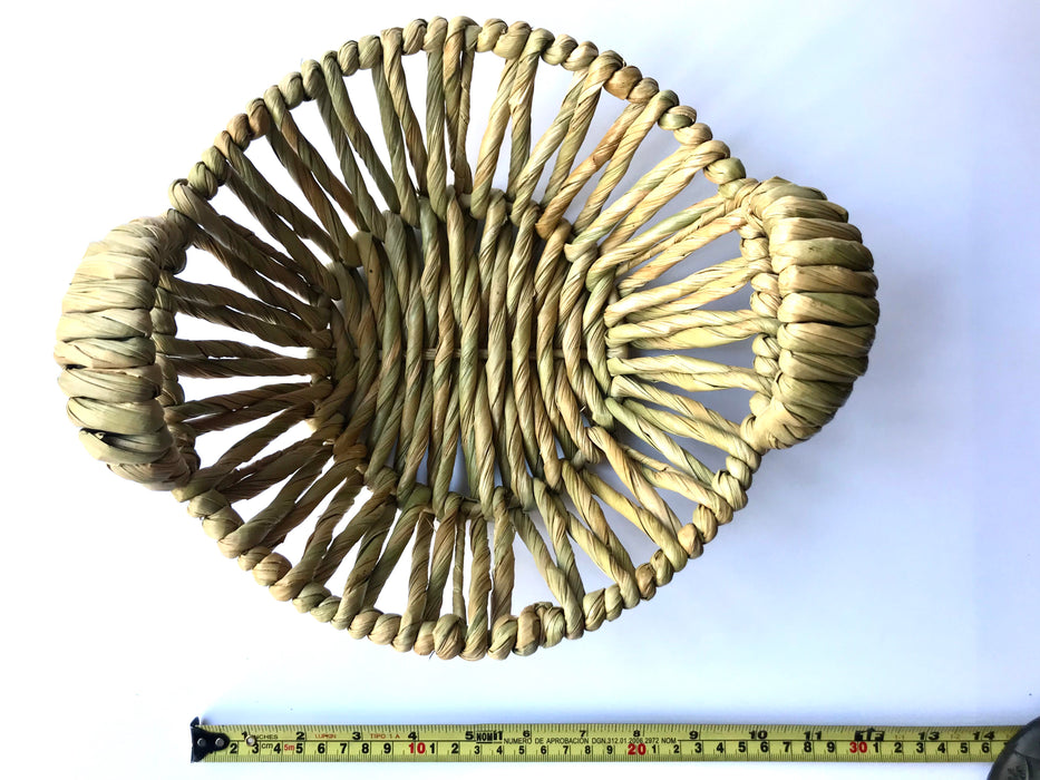 Mexico 1492: Fruit or egg basket made of tule fiber by skillful Michoacán artisans. The thick tule cords offer a comfortable, rich, full texture of this beautiful, natural piece.