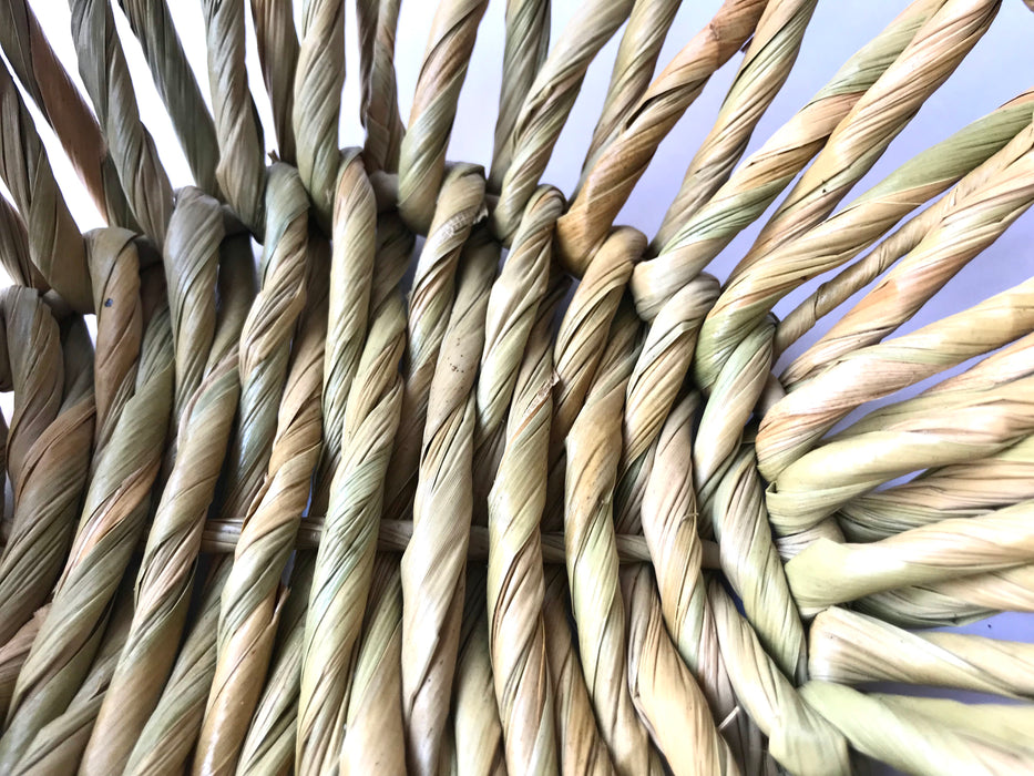 Mexico 1492: Fruit or egg basket made of tule fiber by skillful Michoacán artisans. The thick tule cords offer a comfortable, rich, full texture of this beautiful, natural piece.