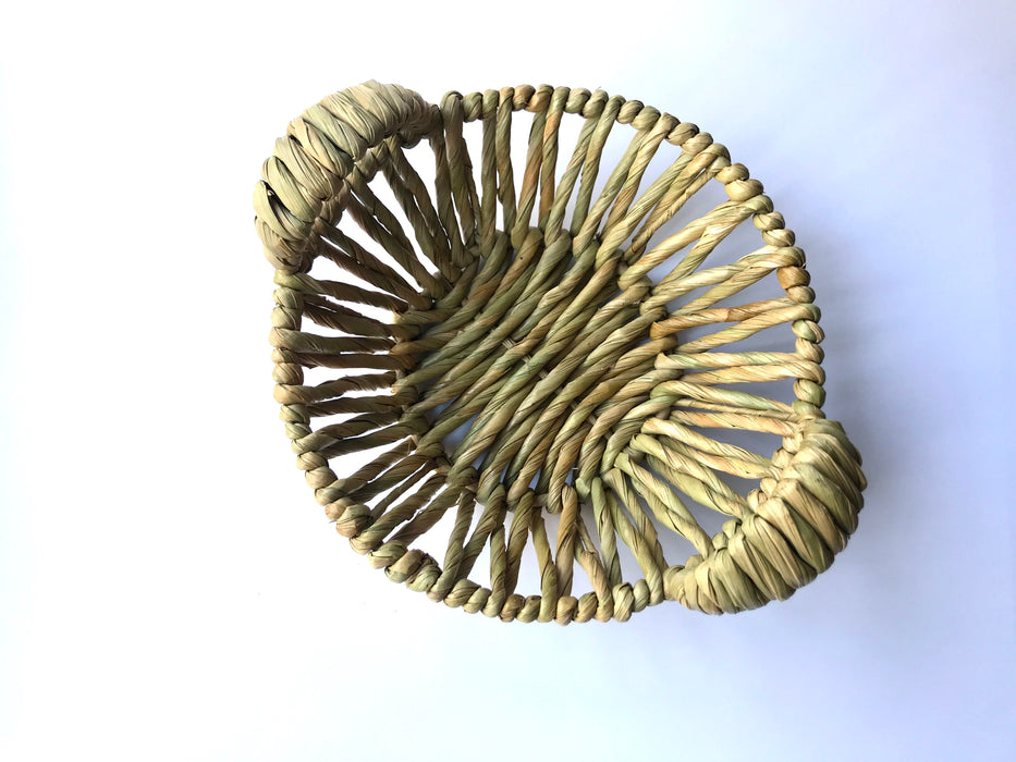 Mexico 1492: Fruit or egg basket made of tule fiber by skillful Michoacán artisans. The thick tule cords offer a comfortable, rich, full texture of this beautiful, natural piece.