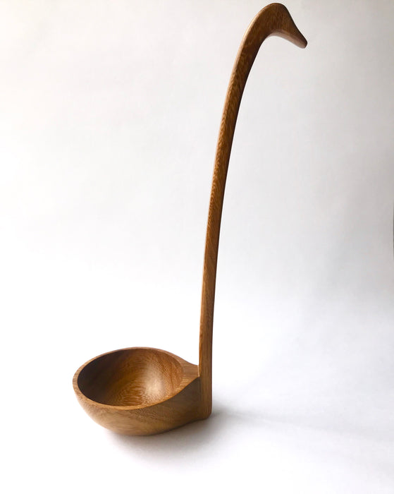 Mexico 1492: A ladle with a long handle and a bird’s head-shaped end, handmade from the cocuite wood by the talented group of nahua artisans, from the south of Veracruz, Mexico. Every individual piece is sanded until smooth. The shiny finish is achieved using the beeswax. No varnish or artificial sealer are used.