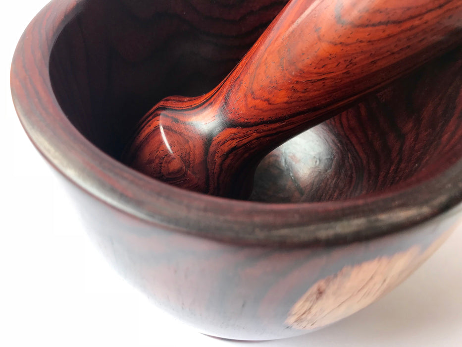 Mexico 1492: Mortar and pestle handmade of deep, dark red granadillo hardwood that grows in the south of Mexico. Perfect for grinding spices or serving salsas and guacamole.