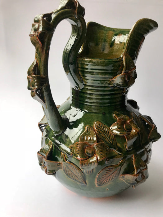 Green Glazed Clay Pitcher with Flower Ornaments