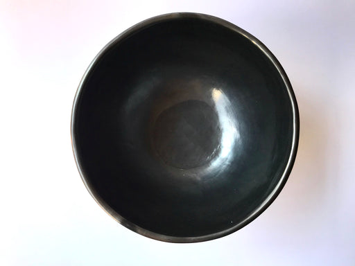 This impressive, handmade, black clay salad bowl from Oaxaca will always be a conversation piece at your dinner. Smooth, shiny black finish. 