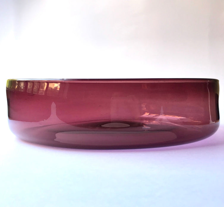 Mexico 1492: Extra generous in size, hand blown salad bowl, made by master blowers of Mexico. Comes in 6 vibrant colors, and a transparent version. Screams party and makes any salad the star course of the meal. Amethyst. 