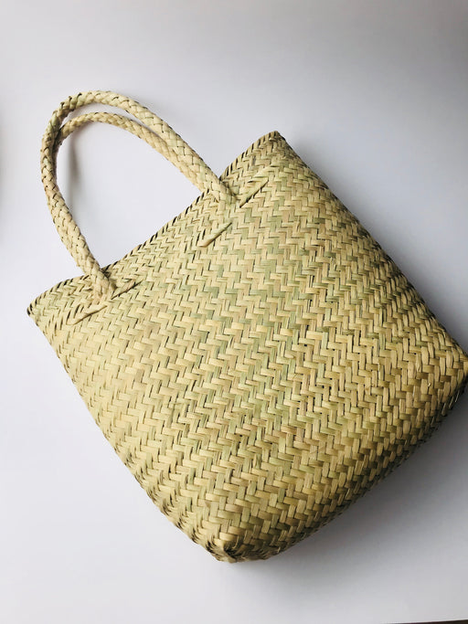 Mexico 1492: Soft but sturdy, this handmade palm bag is your perfect farmers market companion. 