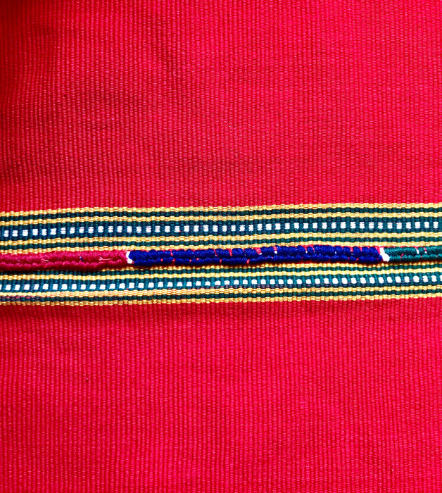 Mexico 1492 - bright red table cloth with colorful edges, handmade on a backstrap loom in Chiapas Mexico. Union of two long pieces. 
